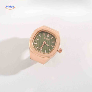 Rose gold ring watch with green square dial.