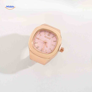 Rose gold ring watch with pink square dial.