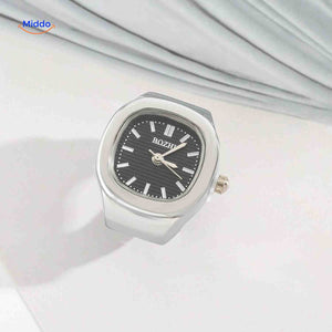 Silver ring watch with black dial, everyday style shot.