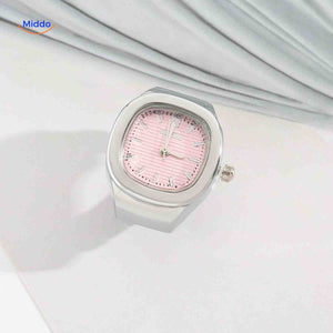 Silver ring watch with pink square dial.