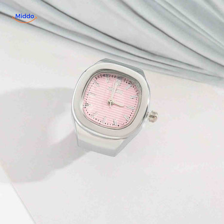 Silver ring watch with pink square dial.