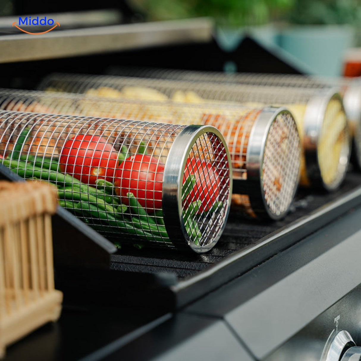 RollingGrill stainless steel grill basket with large capacity for grilling vegetables and meats.