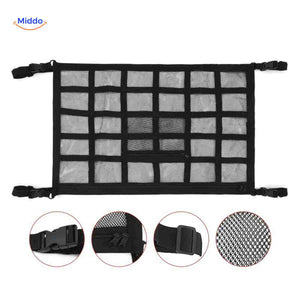 Roof storage net with multiple compartments and buckle straps for secure fit.