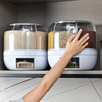 Two rotating grain dispensers with rice and mixed grains showing storage capacity options.