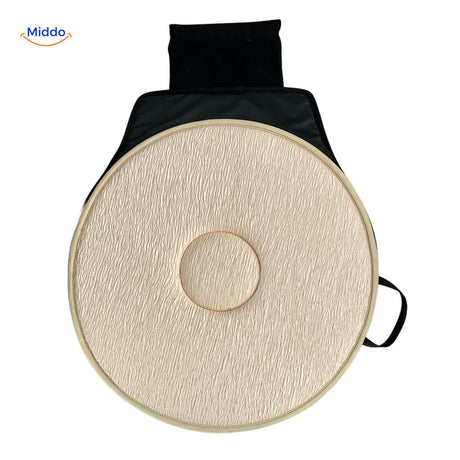 Beige rotating seat cushion for car comfort and easy rotation.