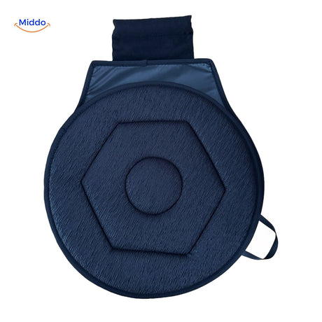 Blue rotating seat cushion for improved sitting posture.