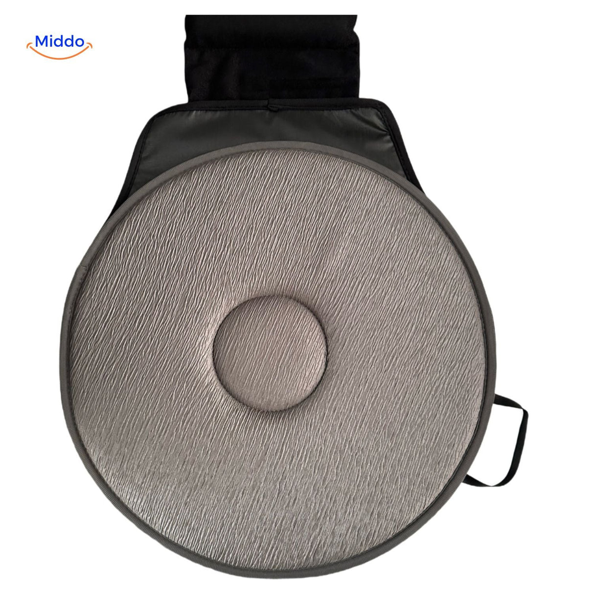 Gray rotating seat cushion with ergonomic back support.