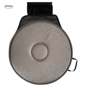 Gray rotating seat cushion with ergonomic back support.