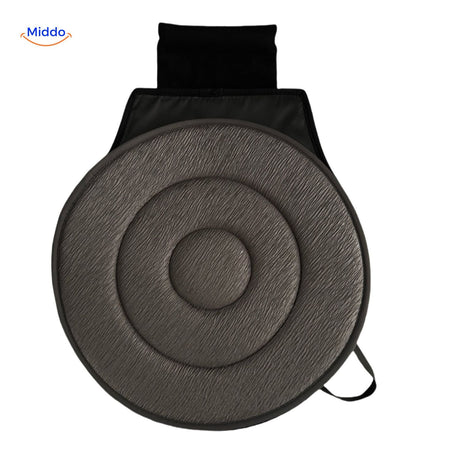 Gray rotating seat cushion for postural support and relief.