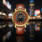Gold roulette dial watch with a brown leather strap