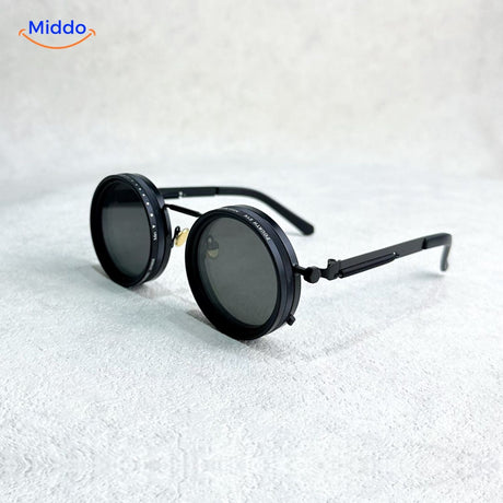 Round black metal frame sunglasses with adjustable UV light reduction.