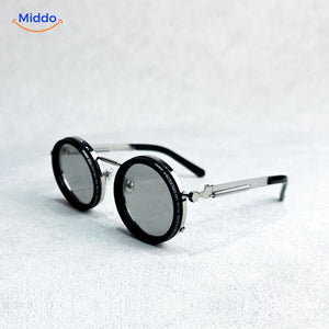 Round metal frame sunglasses with premium UV-protected lens technology.