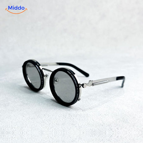 Round metal frame sunglasses with premium UV-protected lens technology.