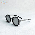 Round metal frame sunglasses with premium UV-protected lens technology.