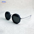 Classic round black frame sunglasses with UV protection lenses.