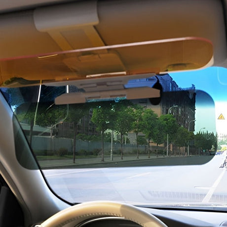 SafeDrive anti-glare visor mounted on car windshield in vehicle.