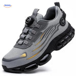 Grey steel toe safety shoes with dial fit system for secure workplace protection.