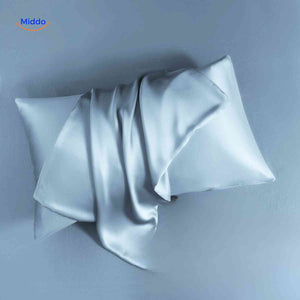 Blue satin pillowcase flat lay smooth premium fabric.