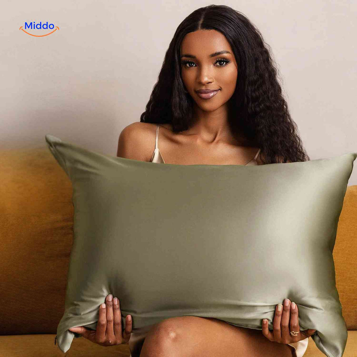 Olive green satin pillowcase styled for comfort sleep.