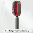 Red self-cleaning hair brush with one-click hair removal button.