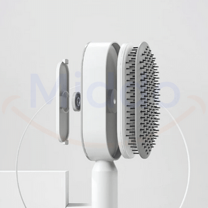 Self-cleaning hair brush with interchangeable attachment heads for different hair types.