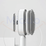 Self-cleaning hair brush with interchangeable attachment heads for different hair types.