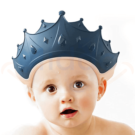 Baby wearing a blue ShampooCrown protective visor during shower.