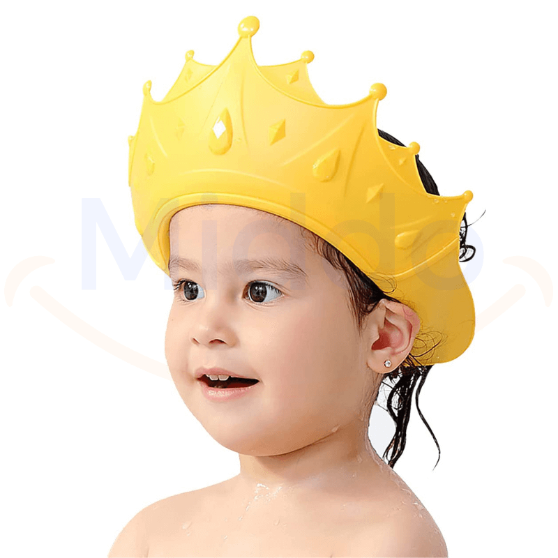 Toddler in a yellow ShampooCrown keeps water and soap out of eyes.