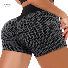 Gray textured ion fiber shaping shorts with seamless construction for smooth body shaping.