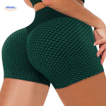 Green textured ion fiber shaping shorts combining style with advanced body sculpting.