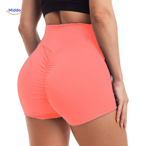 Orange fitted shaping shorts with ion fiber for maximum body contouring and support.