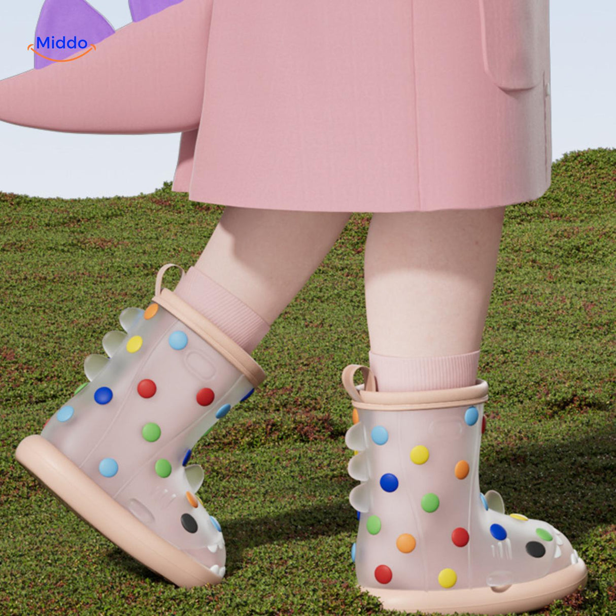 Shark rain boots paired with pink rain jacket, colorful and fun kids' outdoor gear.
