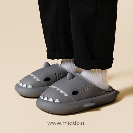 Black shark slippers with classic comfort for the family.