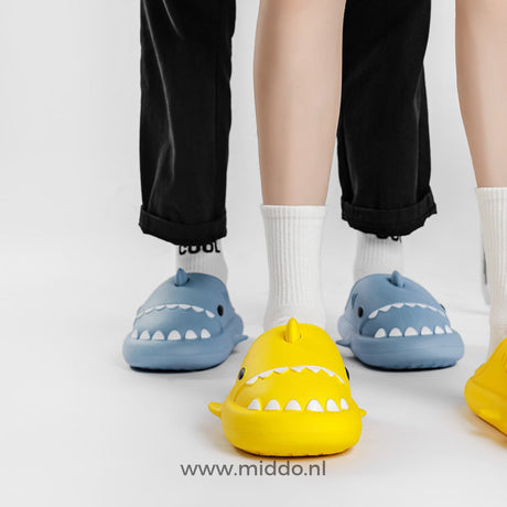 Shark slippers combining comfort and playful style for kids.