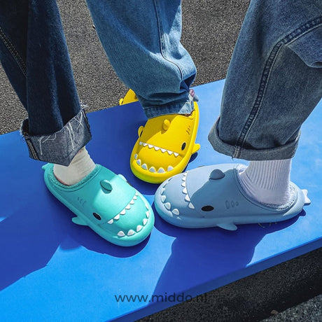 Extremely soft plush lining inside shark slippers for comfort.