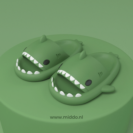 Sharkies shark slippers in green with comfortable cushioned design.