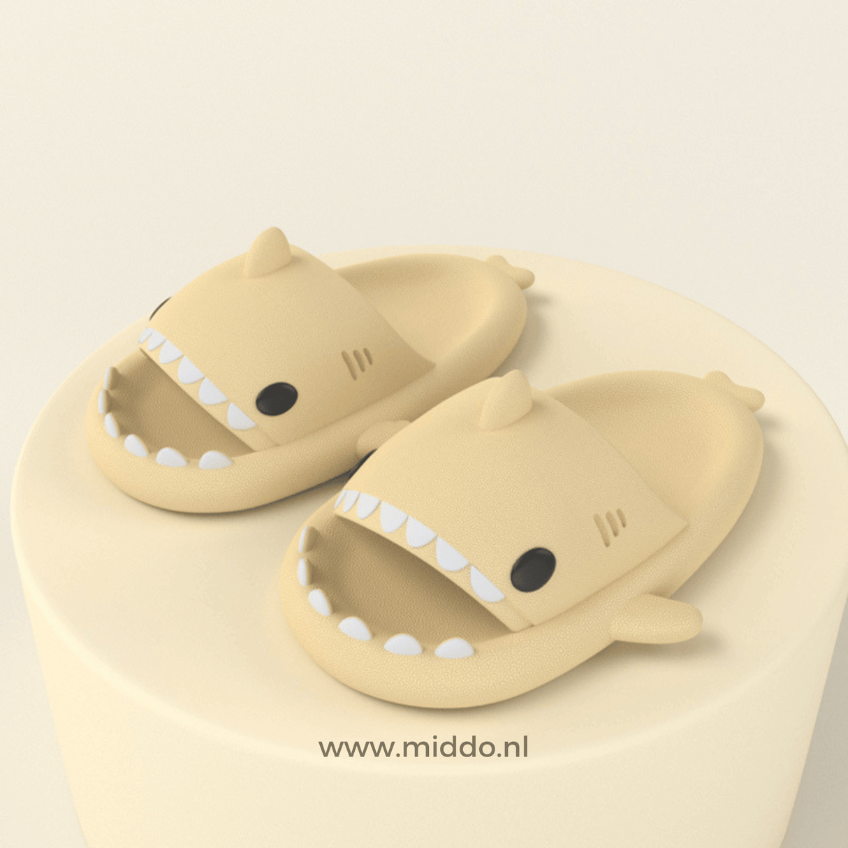 Sharkies shark slippers in light yellow with durable anti-slip base.