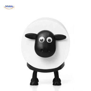 SheepRoll holder in black sheep design, statement bathroom decor piece.