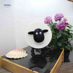 SheepRoll holder with floral design elements, decorative bathroom storage solution.