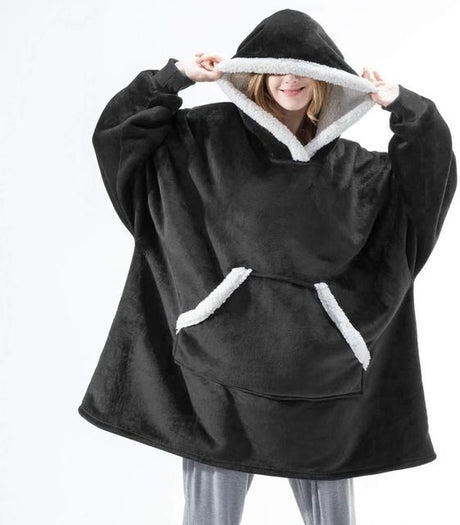 Oversized sherpa fleece hoodie in black with white trim and ultra-soft sherpa fabric.