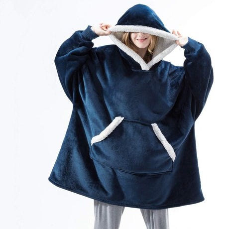 Oversized sherpa fleece hoodie in blue with white trim detail and soft fleece interior.