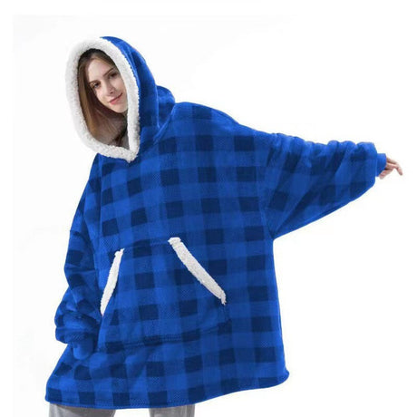 Close-up of oversized sherpa fleece hoodie showing soft plush texture and quality construction.