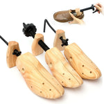 Shoe stretcher pair for making tight shoes wider and more comfortable.