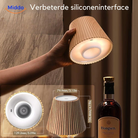 Silicone base adapter for fitting rechargeable lamps to any bottle neck.