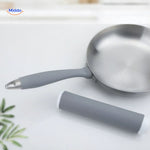 Grey silicone handle protector with heat-resistant anti-slip grip for pans and cookware.