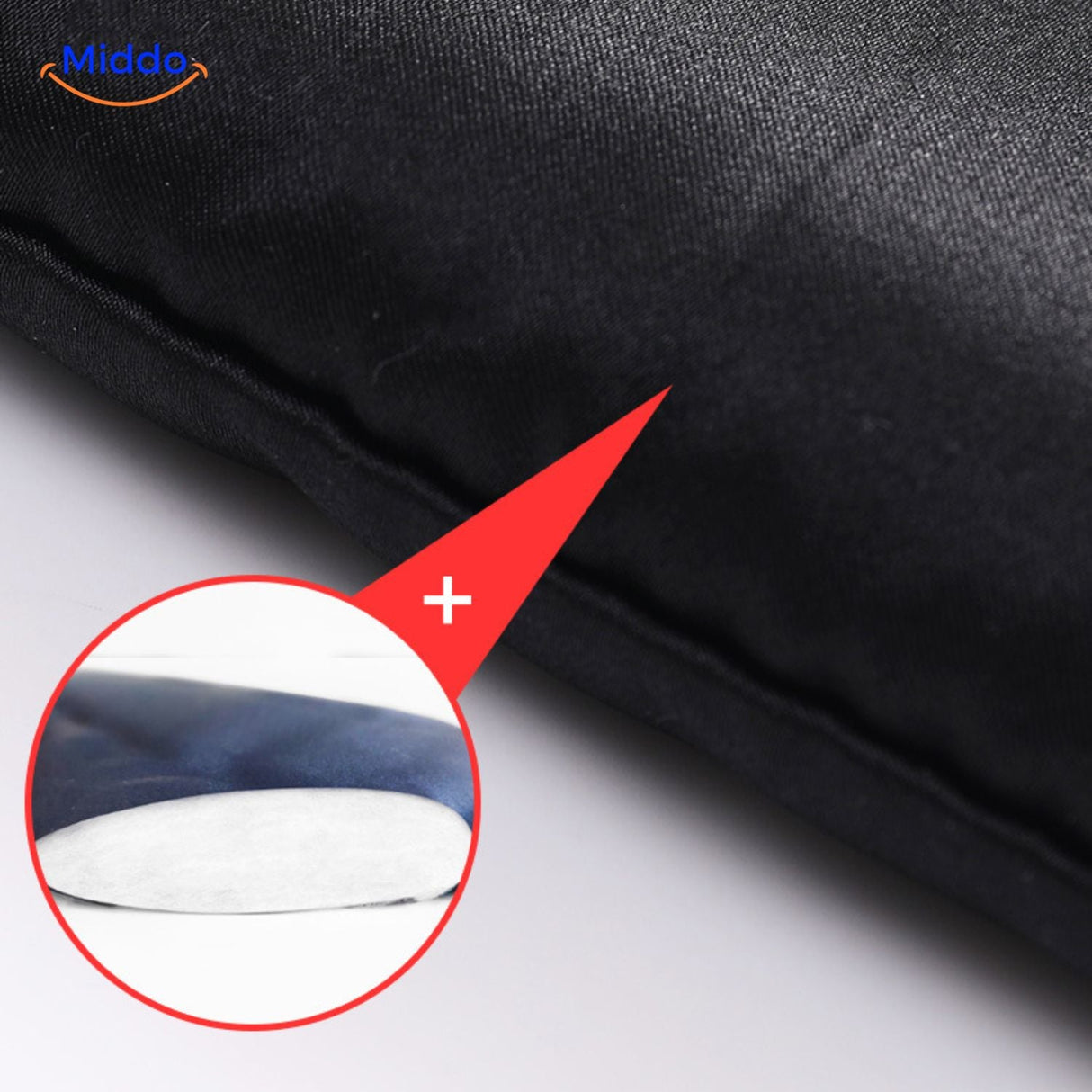 Close-up detail of black silk eye mask showing the smooth mulberry silk weave and elastic design.