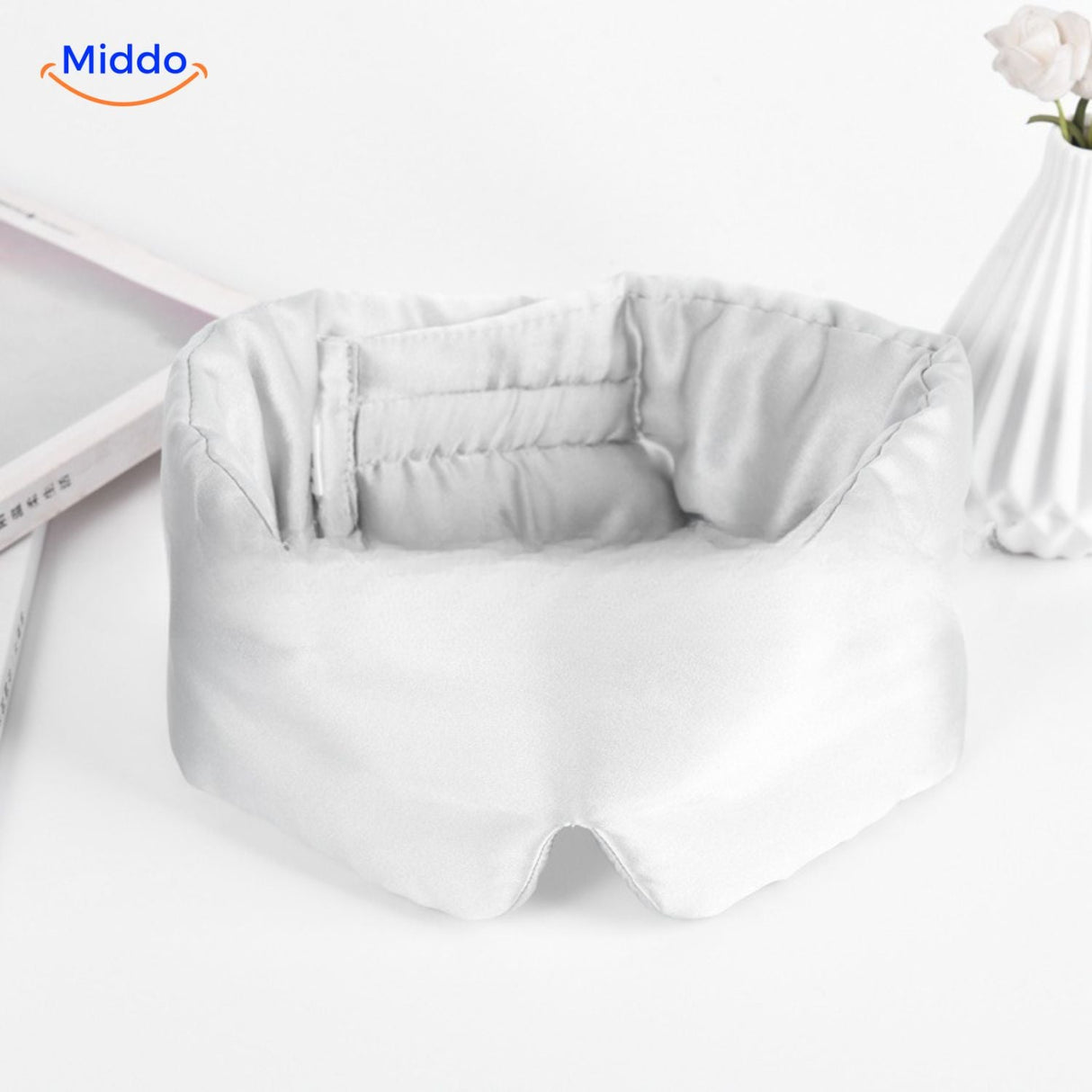 White mulberry silk sleep mask with soft reversible satin finish for peaceful sleep and skin health.