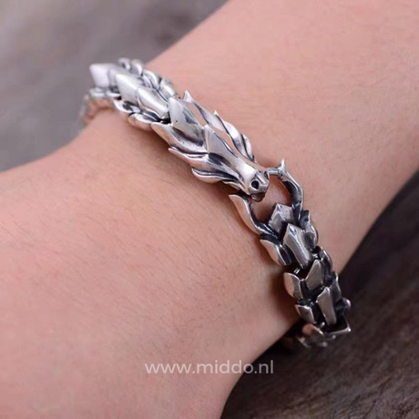 Silver Viking dragon bracelet shown on the wrist from a slightly different angle.