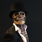 Skeleton costume with removable mask and formal top hat accessory.