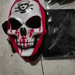 Grim reaper costume set combining skull mask, glowing gloves, and black cape.